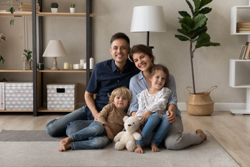 Phoenix Area Family in Their New Home | Red Penny Realty Mesa family enjoying their new home